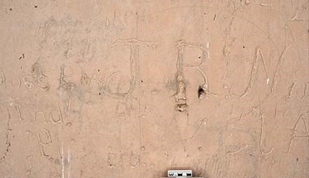 A photograph of historic inscriptions inside the Great House.