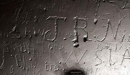 An enhanced photograph of historic inscriptions inside the Great House.