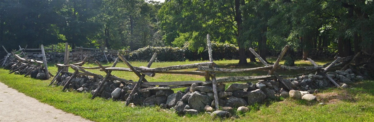 A rock wall enclosure for livestock