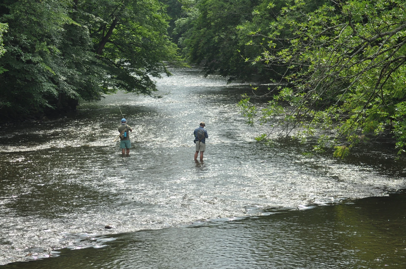 Two people fishing at Shurts Road, a public fishing access on the Musconetcong River owned by the State and managed by the NJ Division of Fish and Wildlife. Photo courtesy of Alan Hunt and the Musconetcong Watershed Association Two people fishing at Shurts Road, a public fishing access on the Musconetcong River owned by the State and managed by the NJ Division of Fish and Wildlife. Photo courtesy of Alan Hunt and the Musconetcong Watershed Association