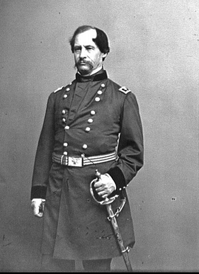 Portrait photograph of David Hunter standing in military uniform