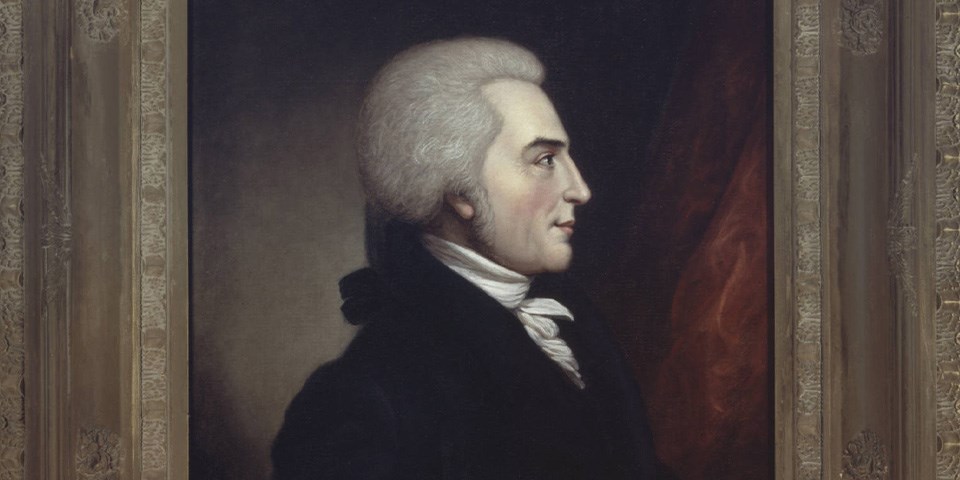 Portrait of Davie with wig and black coat facing right.