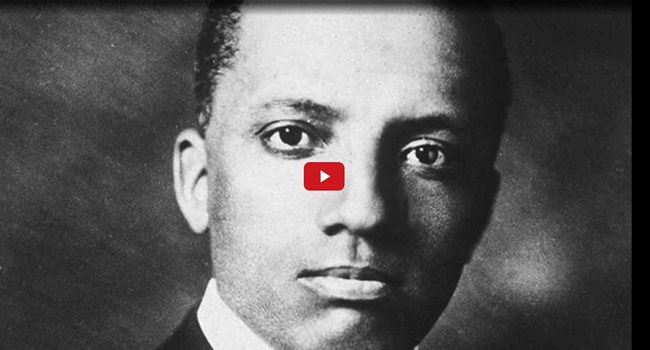 Screenshot of a video showing a historical portrait of Dr. Carter G. Woodson