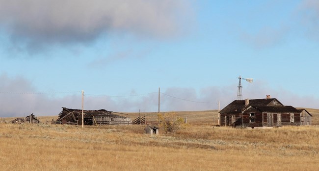 Historic farm buildings on a prairie