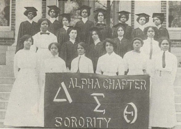 Portrait of Delta Sigma founders holding a banner 1913 Public Domain
