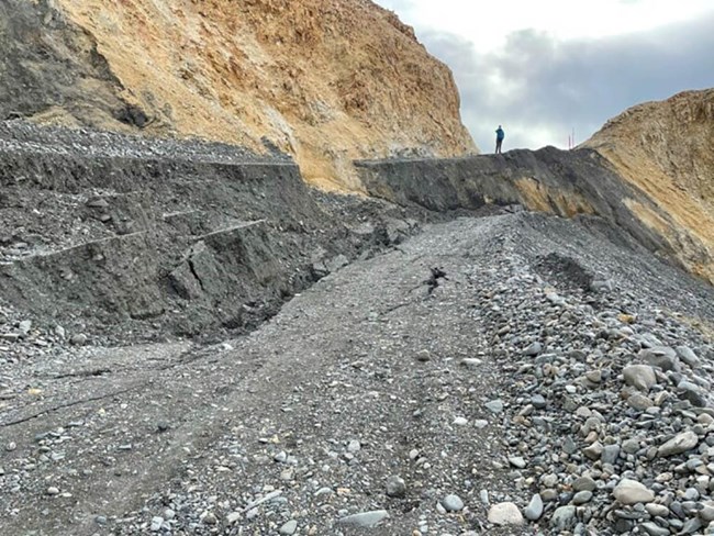 A roadbed slipped tens of feet from grade.