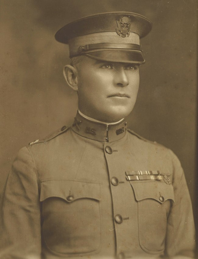 Dunnigan1917 A black and white photograph of a soldier in a World War I-era uniform.