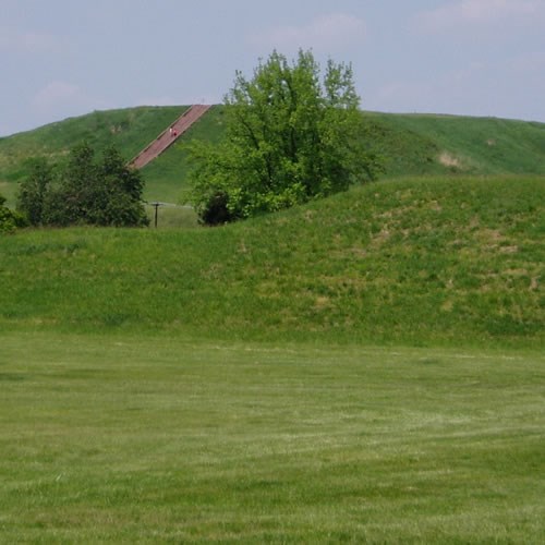 A grassy mound on a sunny day. NPS photo.