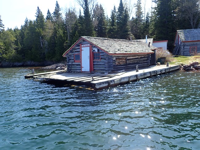 Edisen Fish House on a dock floating in Lake Superior. Edisen Fish House on a dock floating in Lake Superior.