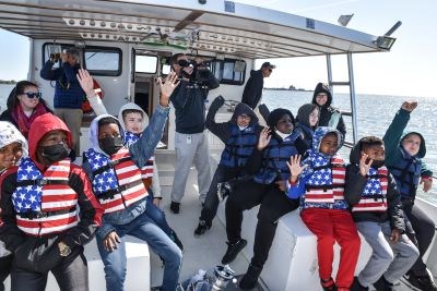 lt= School kids on a boat ride