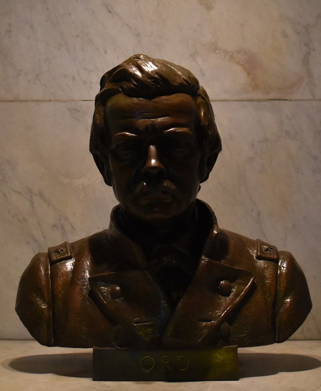 Bronze statue of a man's head