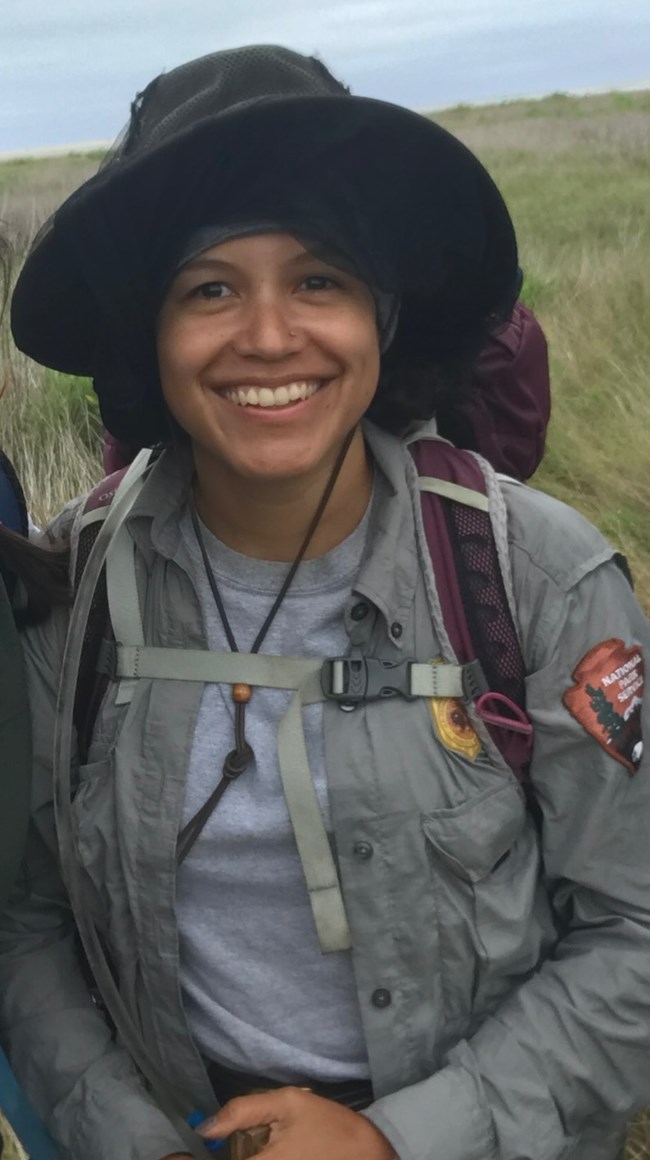 Elizabeth Rico Woman wearing a hat and smiling