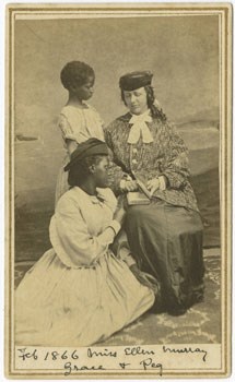 Historic Photograph of a white woman seated with two African American children