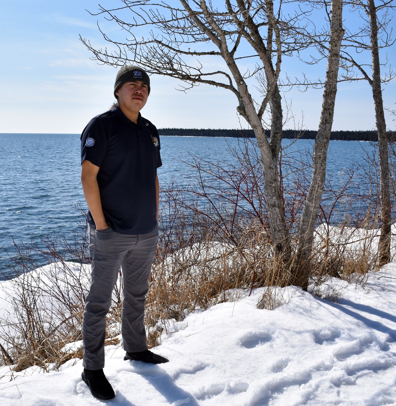 Ethan A person standing in front of a bay.