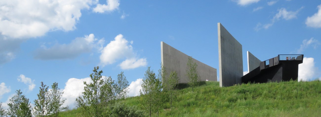 Flight 93 National Memorial against a blue sky. Flight 93 National Memorial against a blue sky.