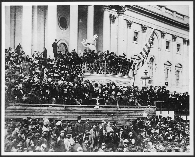 A large crowd gathered on the East Front of the US Capitol to listen to President Abraham Lincoln