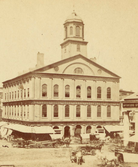 Sepia Toned Photograph of Faneuil Hall. The building is four stories tall, with windows spaced evenly across the middle two floors. A bell tower is atop the building.
