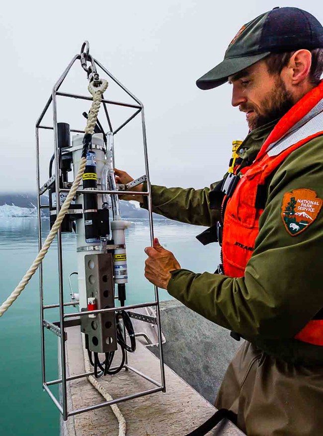 CTD_Sensors_web A scientist readies equipment.