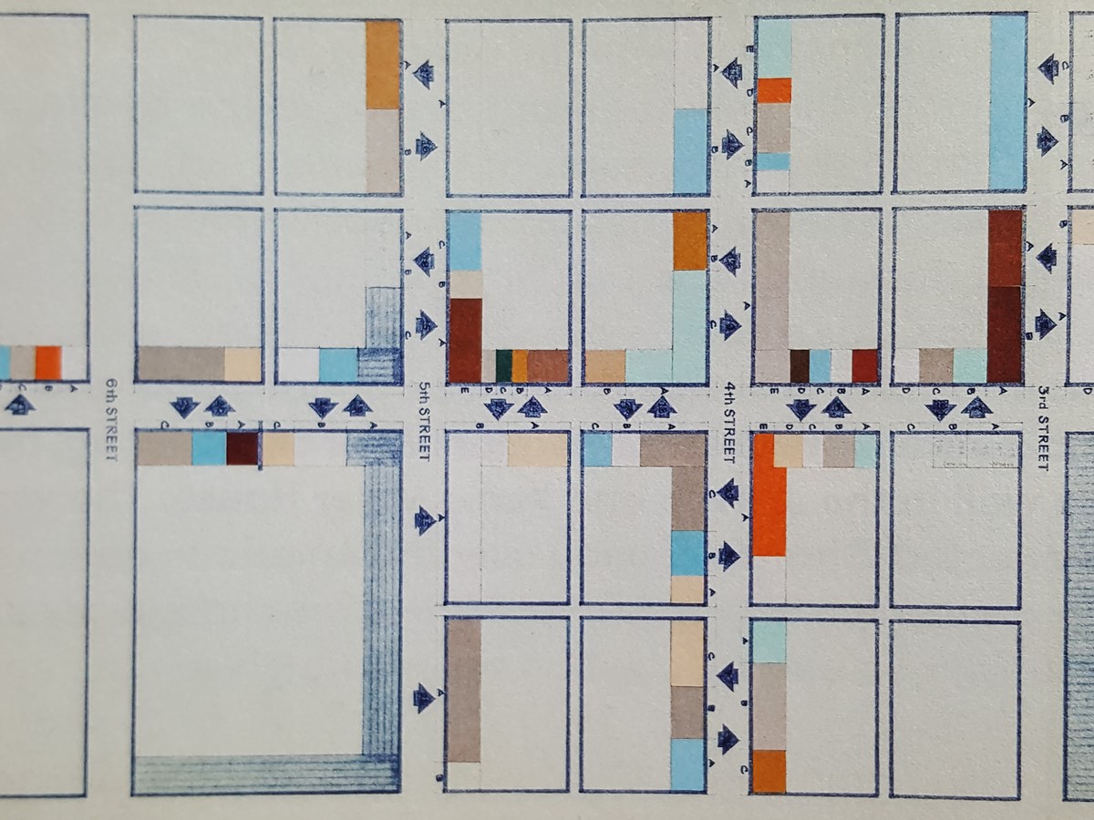 Drawing: Map rectangles indication building colors including tan, green, orange, blue, sky blue, and peach.