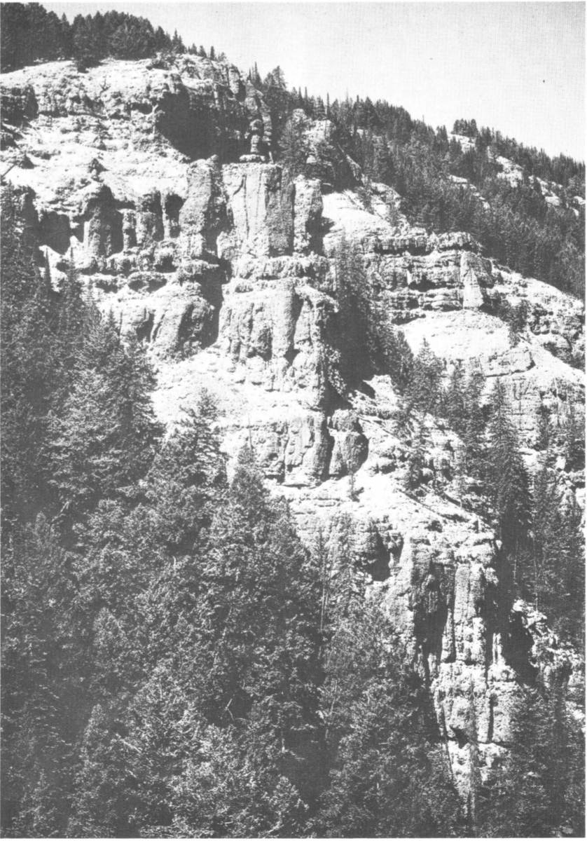 black and white photos of hillside banded cliffs