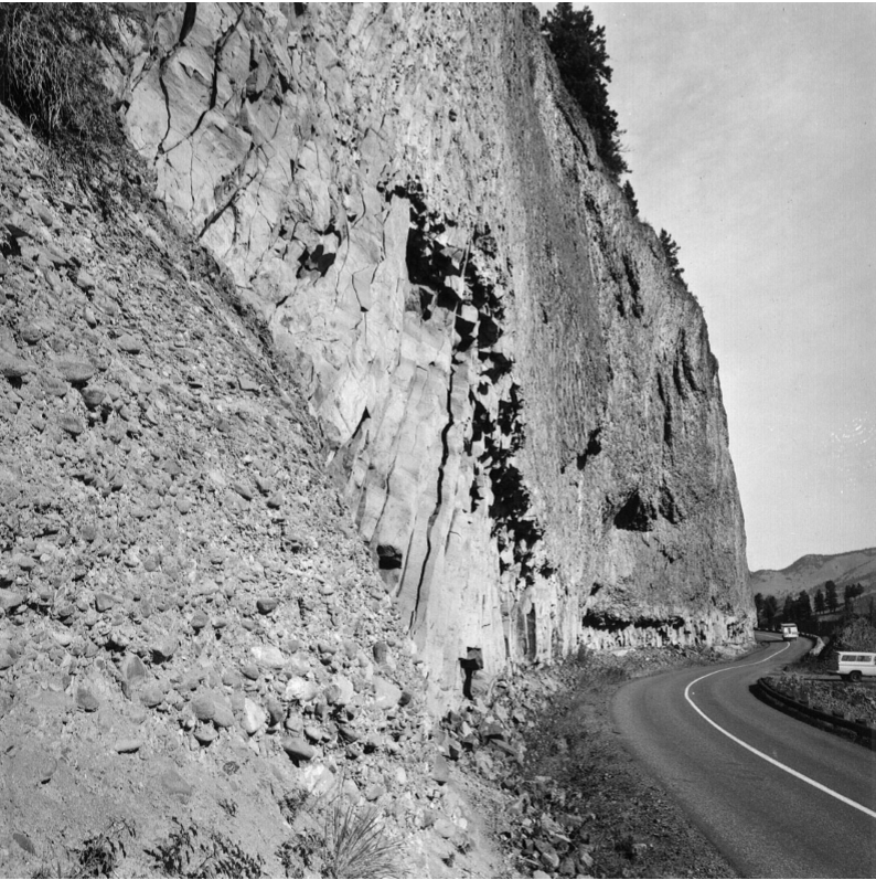 black and white photos of roadside cliffs