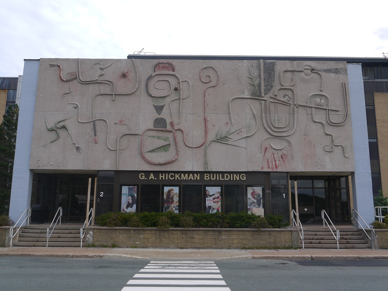 3-D abstract mural façade of the G.A. Hickman Building.
