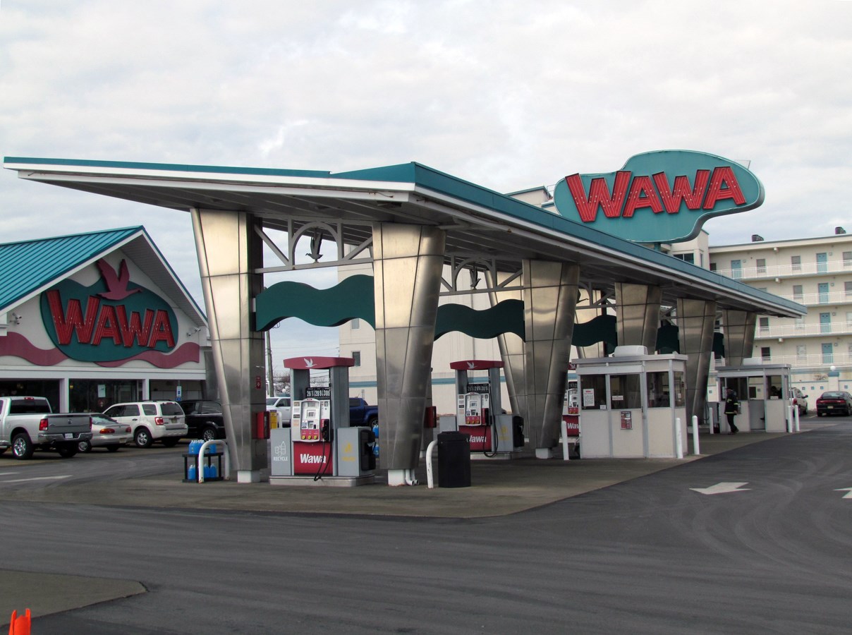 WAWA gas station Modern gas station with turquoise trim and marron text on sign reads WAWA.