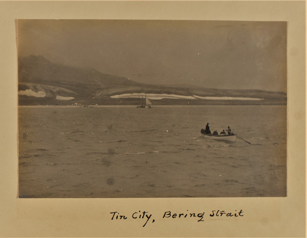 Historical photo of small boats in the Bering Strait.