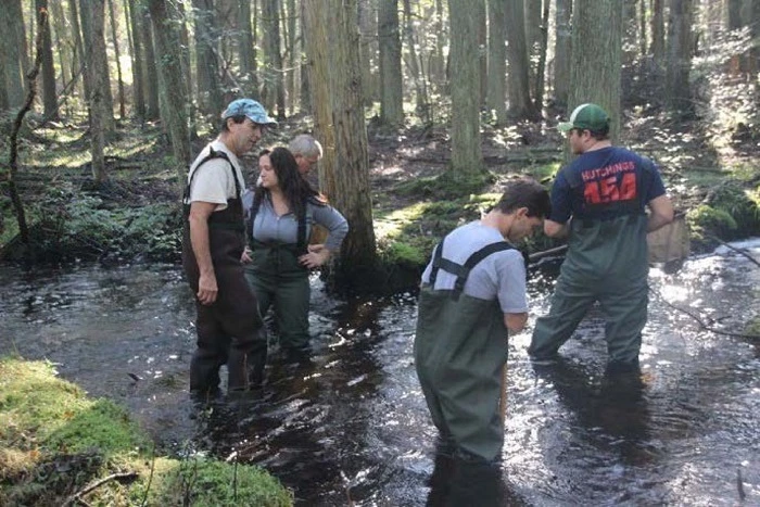 Students from Richard Stockton University learning about water quality while doing a streamside Macroinvertebrate survey.  Photos provided by Lynn Maun. 2 Students from Richard Stockton University learning about water quality while doing a streamside Macroinvertebrate survey.  Photos provided by Lynn Maun.