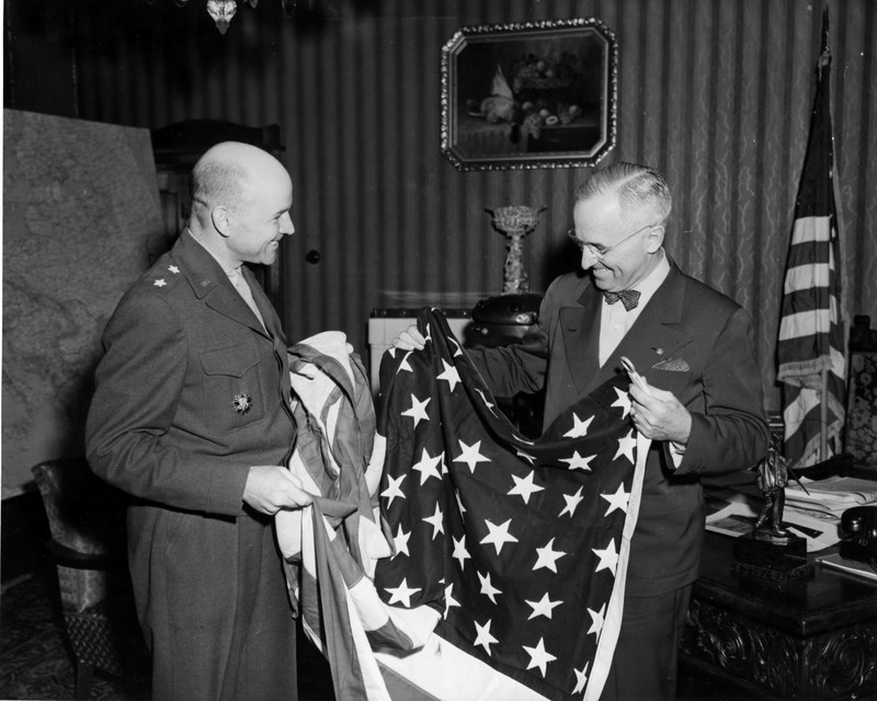American General presents flag to President Truman