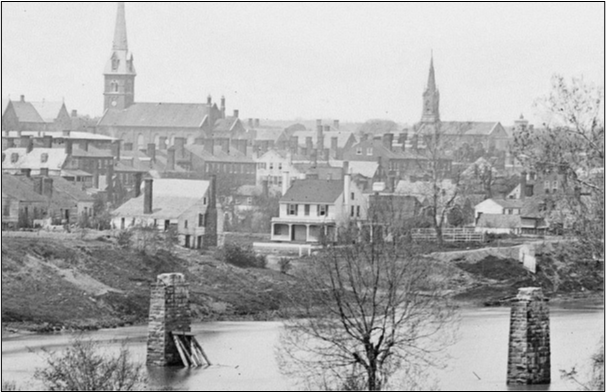 Fredericksburg Panorama Panoramic view of Fredericksburg in 1863 with a red arrow indicating the home of A. P. Rowe.