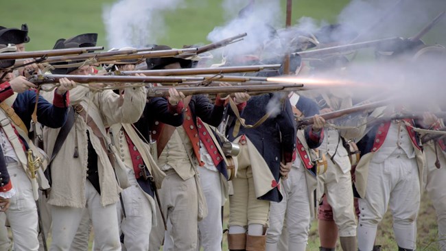 outdoors, soldiers, muskets firing