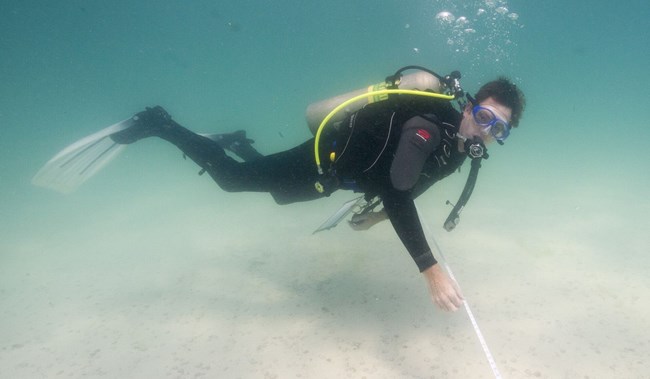 David Morgan surveying a submerged cultural resource.