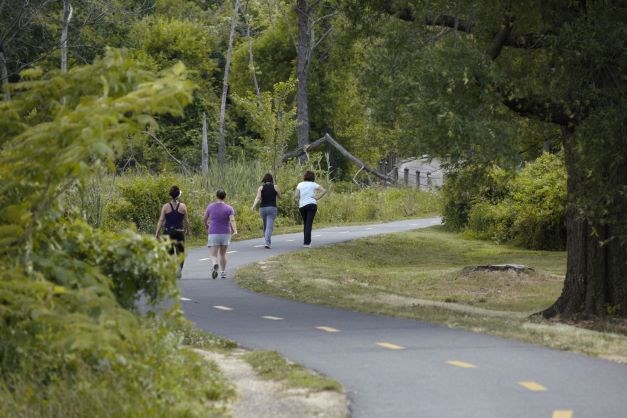 GWMP_20120607_AD (159) Four people walk together down the Mount Vernon Trail along the George Washington Memorial Parkway.