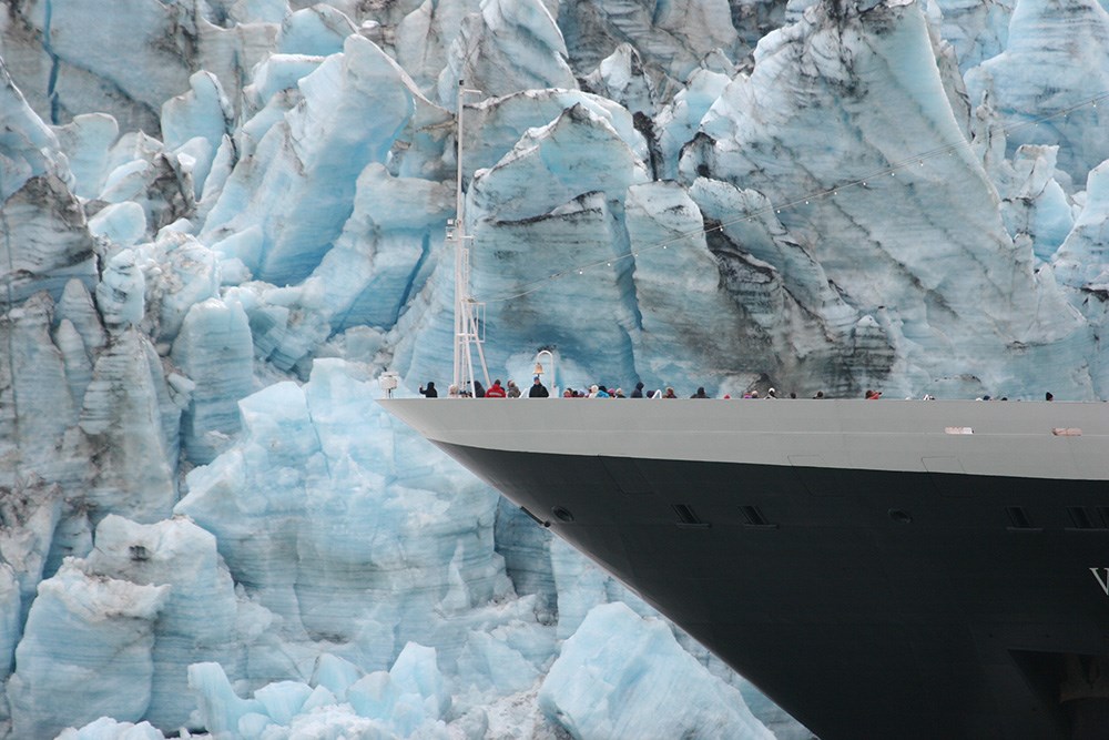 Gende_Fig1a_web A large cruise ship noses in close to the face of a tidewater glacier.