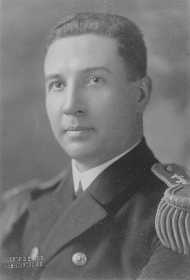Lieutenant Commander George J. McMillin, November 11, 1925 White man wearing a formal naval uniform