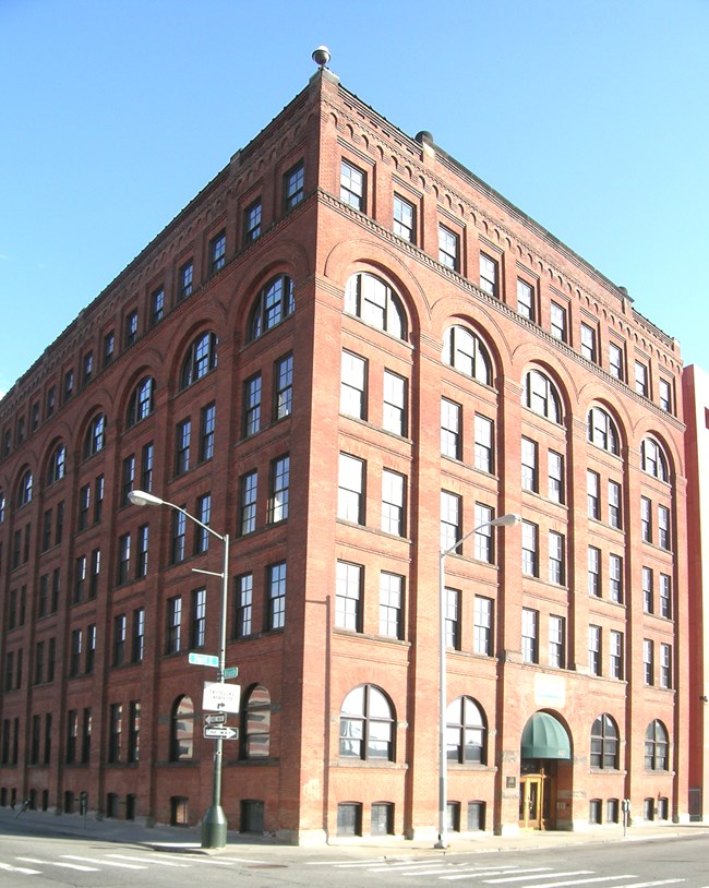 Tall brick building. Tall brick building.