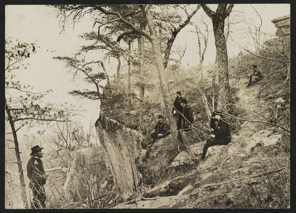 Grant and soldiers sit on top of lookout mountain.