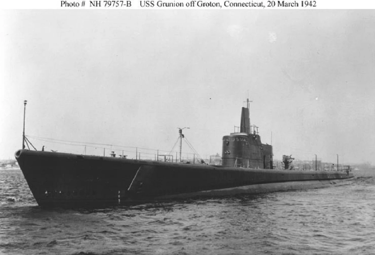 Grunion near Connecticut Large gray submarine above the waterline.