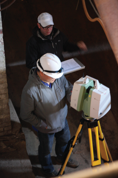 HABS Surveyors HAER Architect John Wachtel (top) and HABS Architect Daniel De Sousa laser scanning the basement corridor.