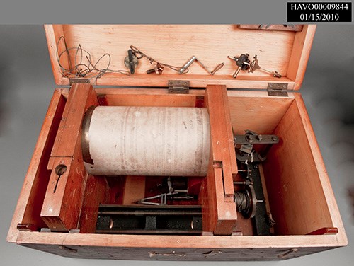 Seismograph from the early 1900s. Seismograph drum inside wooden box.