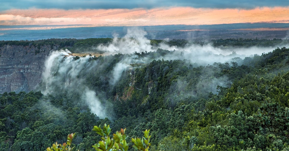 steaming fumaroles alone the crater rim