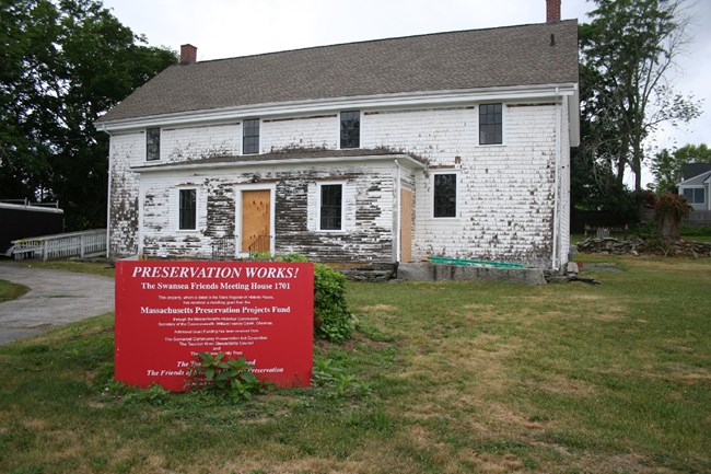 historic wooden building in white