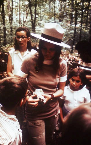 Women demonstrating to kids
