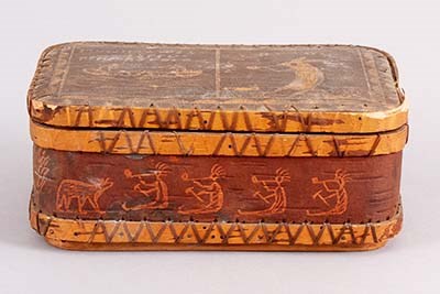 Birch box etched with figures of human figures and animals.