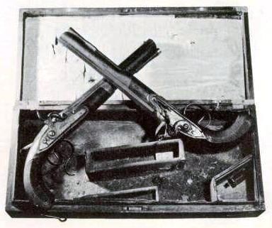 A black and white photograph of the duelling pistols
