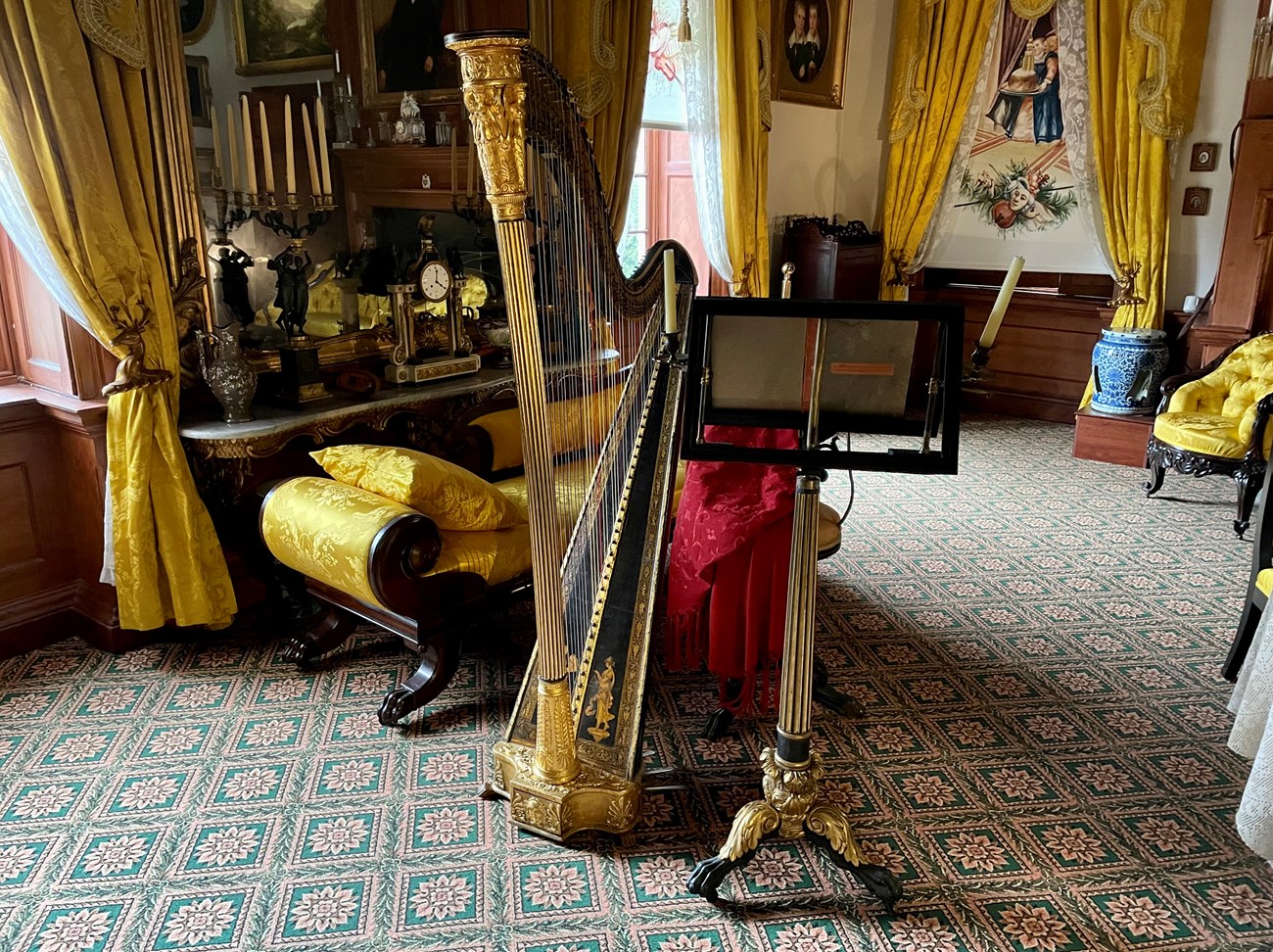Erard harp on display in music room, post-conservation