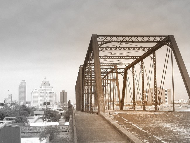Hay Street Bridge: Early-1900s former railroad bridge now open to pedestrian traffic only, with city views. Hay Street Bridge: Early-1900s former railroad bridge now open to pedestrian traffic only, with city views.