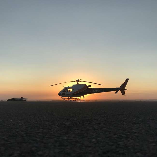 Helicopter with setting sun in background Helicopter with setting sun in background (Keith Mitchell, NPS)