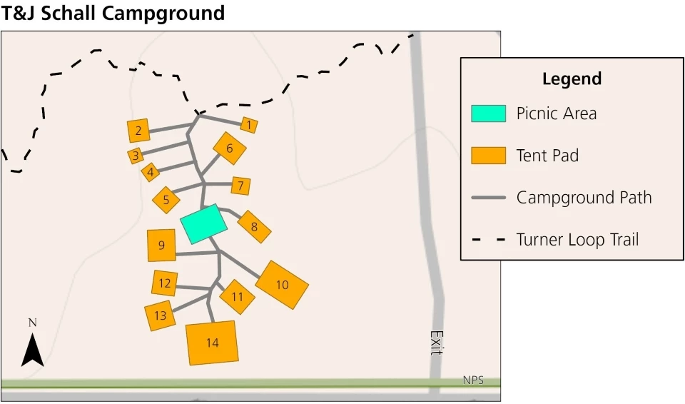 T&J Schall Campground Map Map of the T&J Schall Campground. There are 14 walk-in tent pads of various sizes, and a picnic area in the center. The map shows the campground path and a trail that goes by the campground.